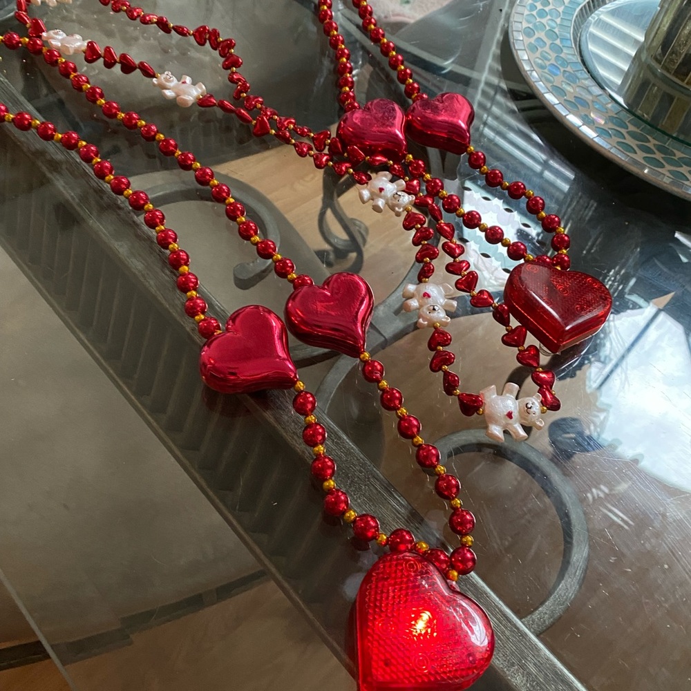Valentines light up heavy hearts Mardi Gras beads n  teddy bears /throws